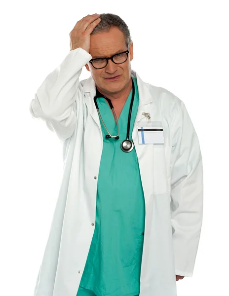 Senior physician having headache — Stock Photo, Image