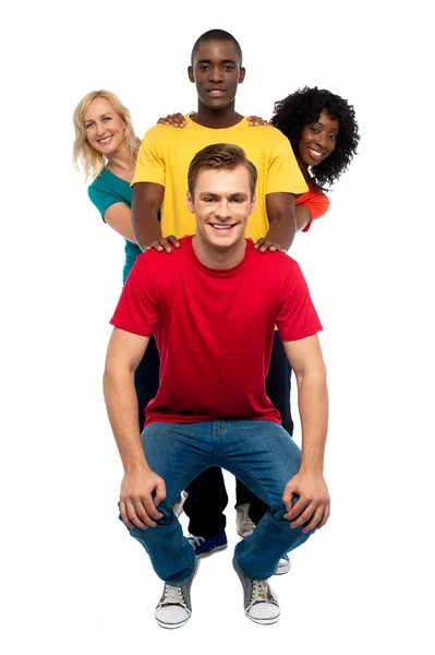 Young standing behind semi seated guy — Stock Photo, Image