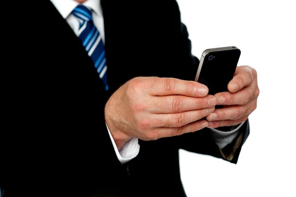 Cropped image of a man sending message — Stock Photo, Image