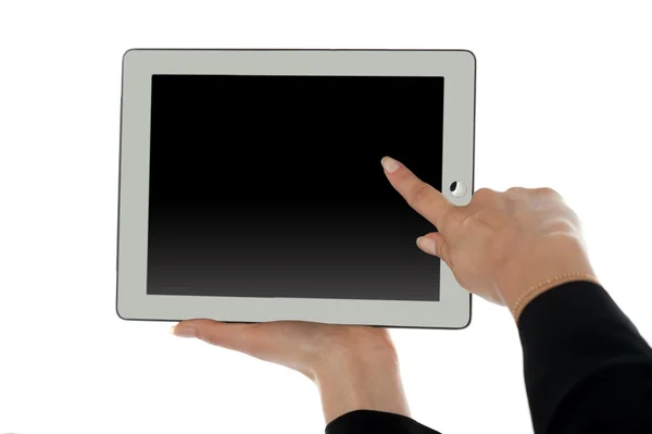 Dedo femenino apuntando a la pantalla en blanco de la tableta PC — Foto de Stock