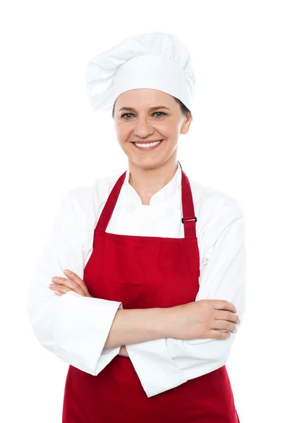 Portrait of smiling middle aged cook in uniform — Stock Photo, Image