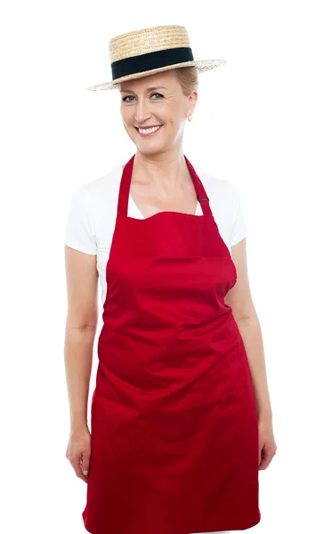 Trendy middle aged cheerful cook wearing hat — Stock Photo, Image