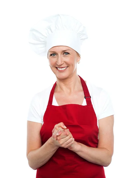 Piękna kobieta kucharz patrzy na Ciebie — Zdjęcie stockowe
