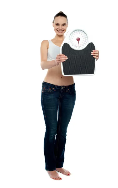 Full frame woman holding a scale — Stock Photo, Image