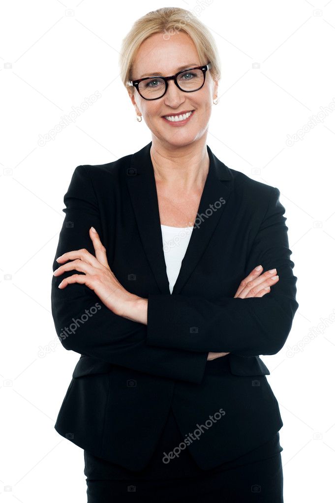 Businesswoman with crossed arms wearing glasses