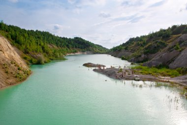 Beach in the early Cretaceous quarries in Belarus clipart