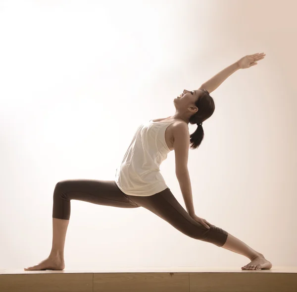 Beautiful asian girl with yoga pose — Stock Photo, Image