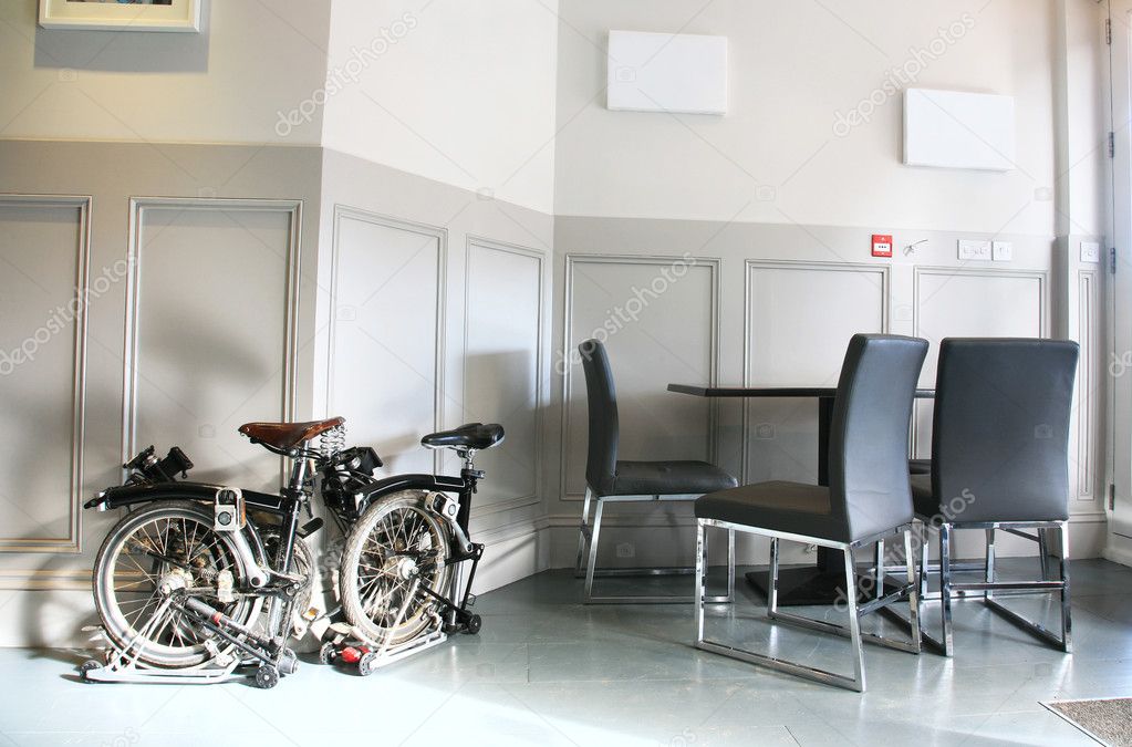 Folding bicycles in the office Stock Photo by ©anizza 11258583