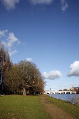 Public walk path along the River Thames clipart
