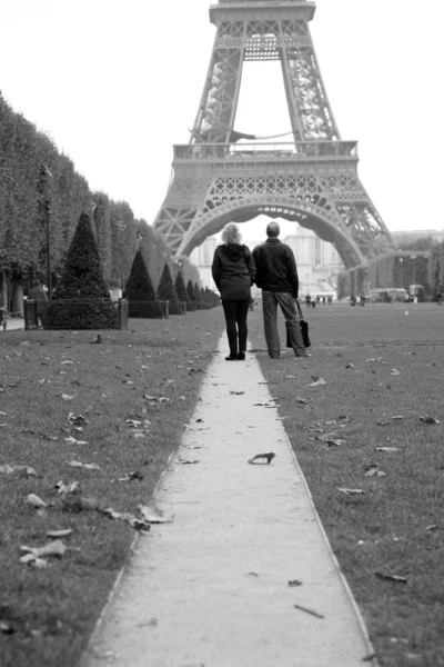 stock image Couple tourist watching the Eiffel Tower in distance.