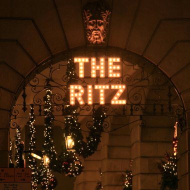 The Ritz hotel sign with Christmas decoration at night clipart