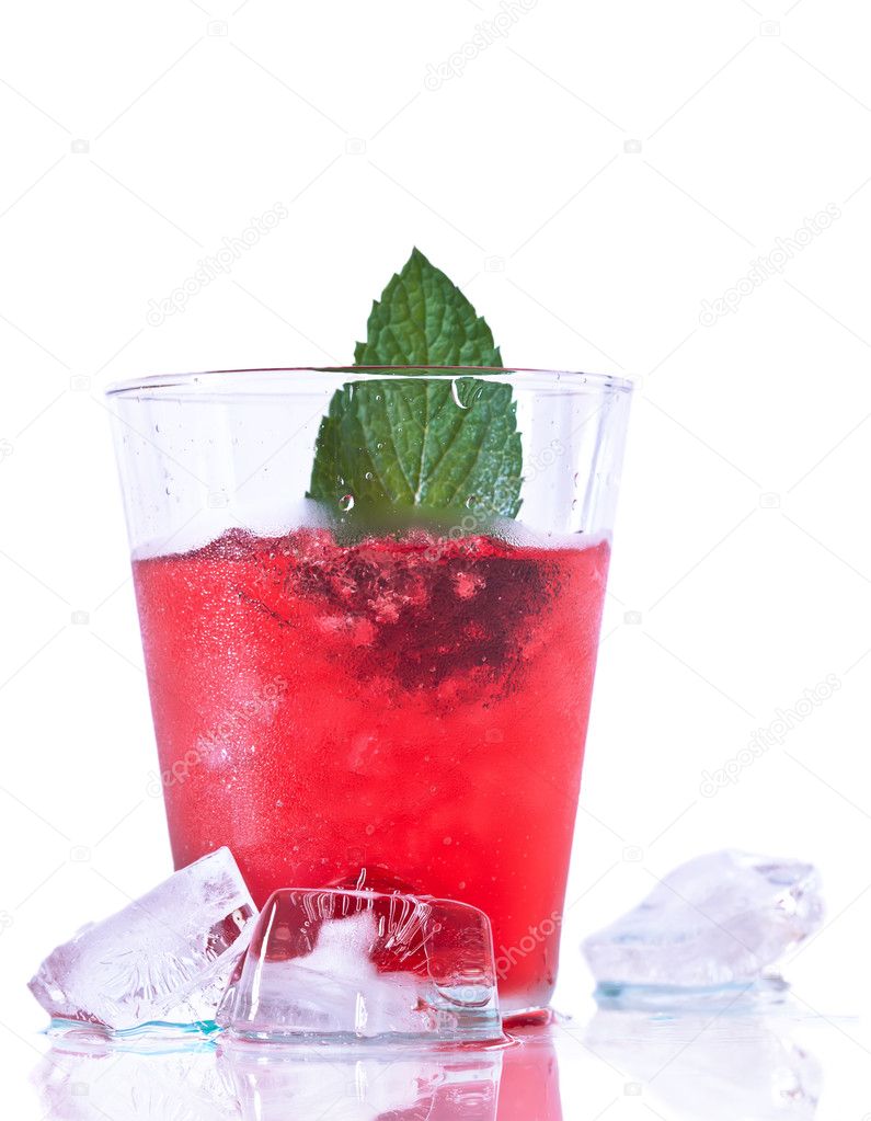 Berry compote with fresh strawberries, mint and ice in glass iso