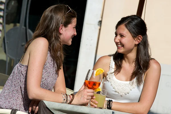 Two Young Women Cheering with Cold Drinks — Stock Photo, Image