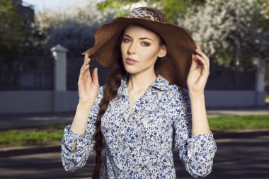 Portrait of girl in the hat clipart