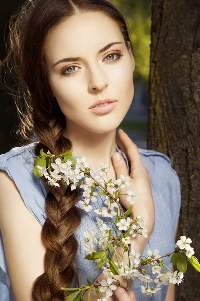 Portrait of woman with flower — Stock Photo, Image