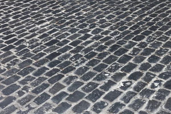 Старая каменная мощеная улица — стоковое фото