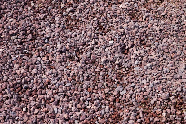 Μικρές πέτρες και τους βράχους στο δρόμο — Φωτογραφία Αρχείου