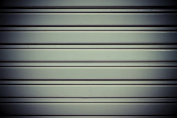 Cool industrial metal gray door background — Stock Photo, Image