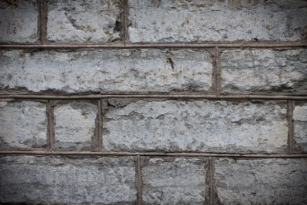 Skadade grå stenmur textur bakgrund — Stockfoto