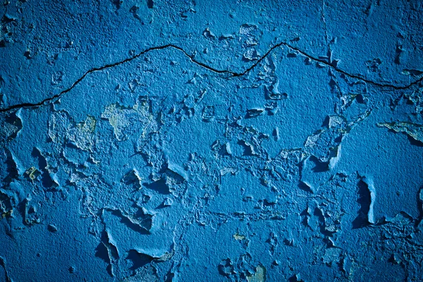 Конструкция бетонной стены со старой синей краской — стоковое фото