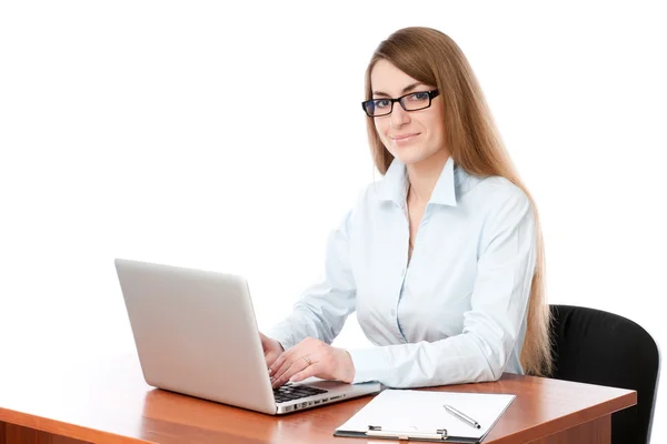 stock image Pretty girl working at the computer. On a white background.