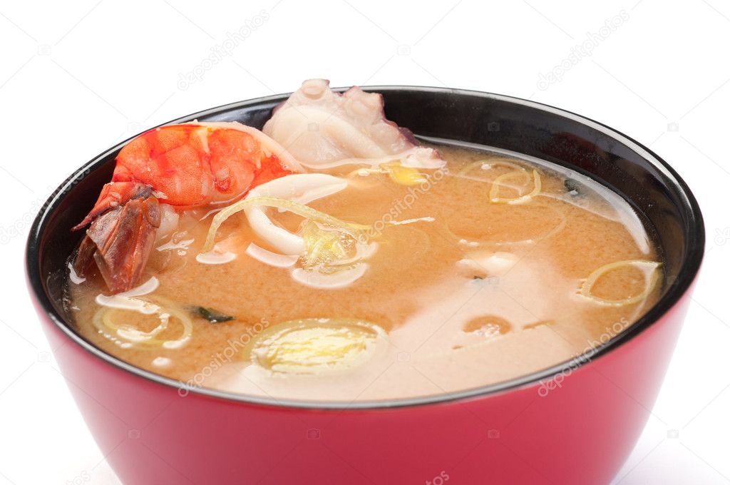 Soup. Miso soup with seafood. On a white background. Tiger shrim