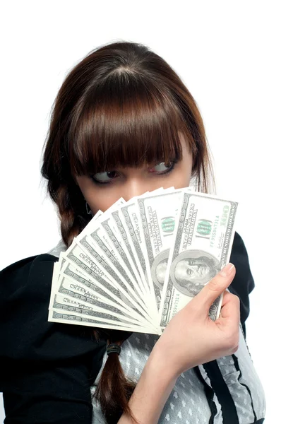 A jovem mostra um fã de dinheiro. Em um fundo branco . — Fotografia de Stock