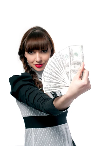 Jong meisje toont een fan van geld. op een witte achtergrond. — Stockfoto