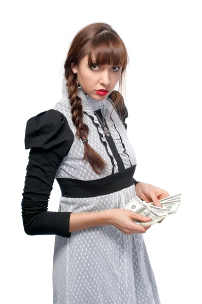 Uma jovem com dinheiro nas mãos. Em um fundo branco . — Fotografia de Stock