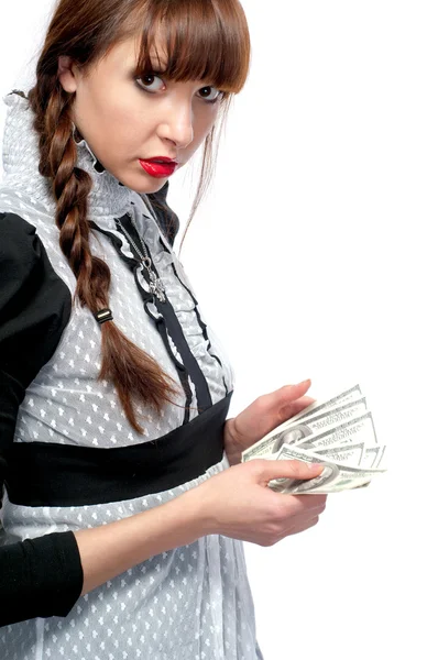 A young girl with money in their hands. On a white background. — Stock Photo, Image