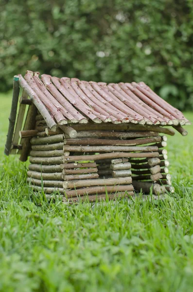 Wooden house on the grass. — Stock Photo, Image
