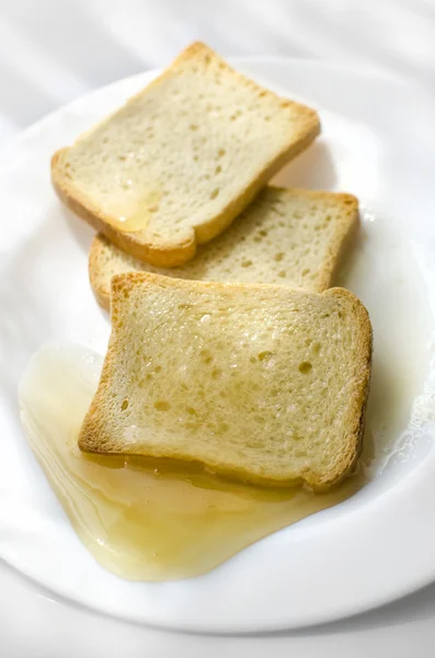 Хлеб с медом — стоковое фото