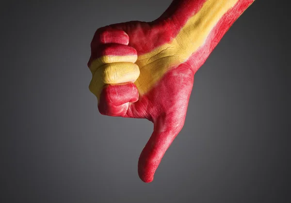 Mão pintada com a bandeira da Espanha e expressando negatividade — Fotografia de Stock