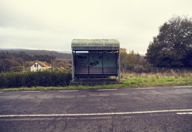 Rural bus stop with a vintage style clipart