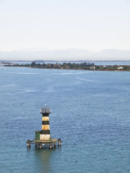 stock image Seascape with a beacon at sea