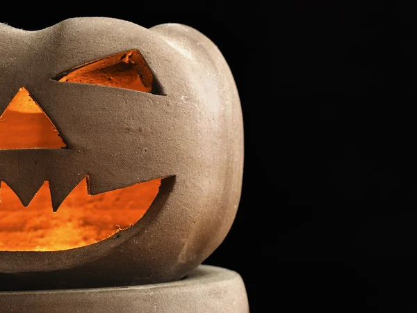 Halloween pumpkin made of clay on black background — Stock Photo, Image