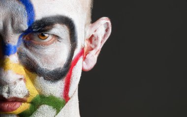 Olympic rings painted in face man clipart