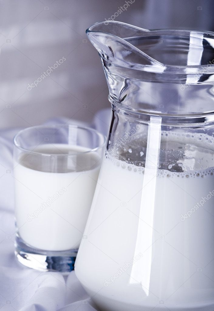 Milk in the glass and jug