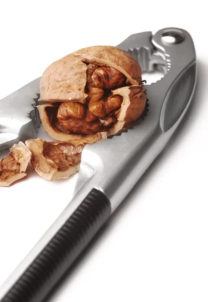 Walnut and nutcracker — Stock Photo, Image