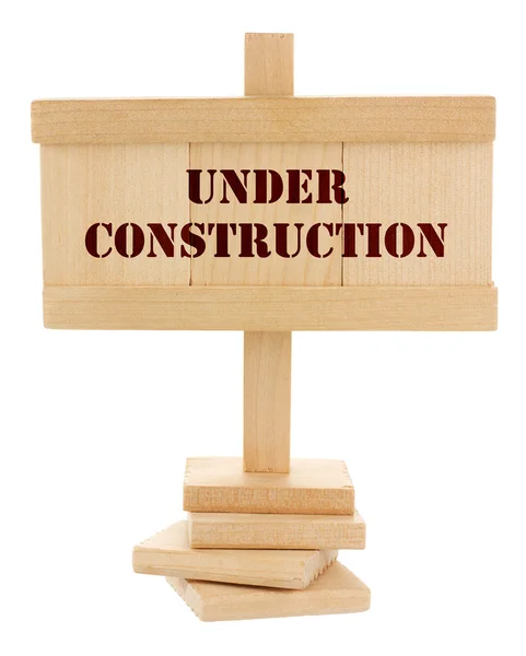 Under construction wooden tablet — Stok Foto