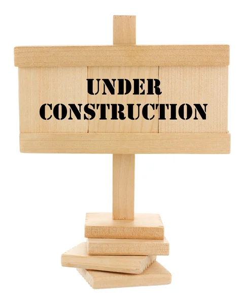 Under construction wooden tablet — Photo