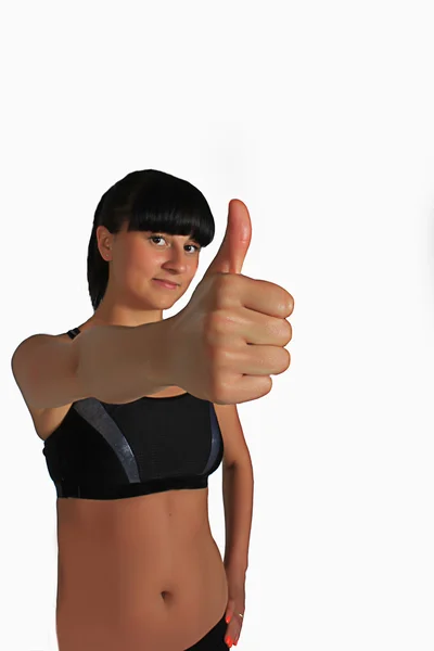 Mulher de fitness. Emocionado mostrando polegar para cima — Fotografia de Stock