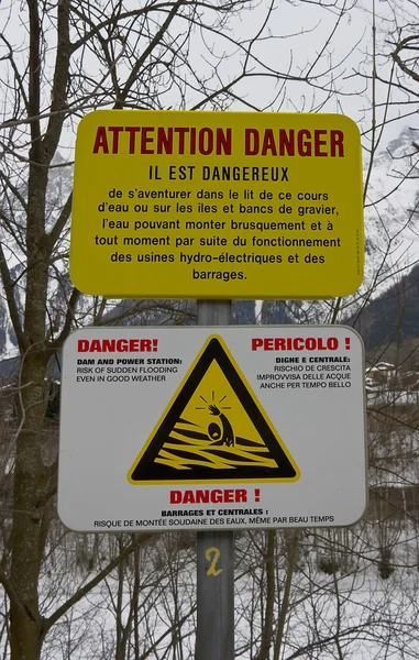 Warning sign of dam and power station — Stock Photo, Image