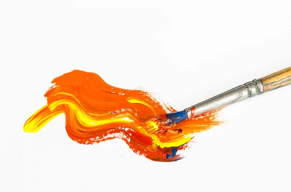 Paint brush with orange painting — Stock Photo, Image