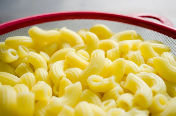 stock image Raw macaroni in bowl ready for cooking