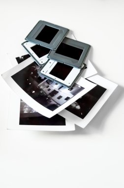 Pile of slides and old photographs clipart