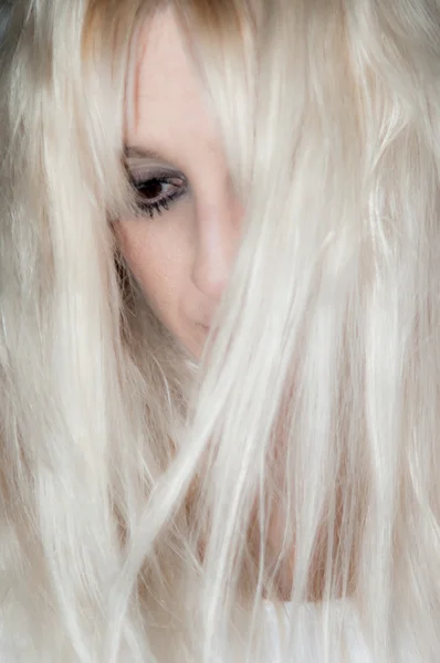 A worrying blonde beautiful girl — Stock Photo, Image