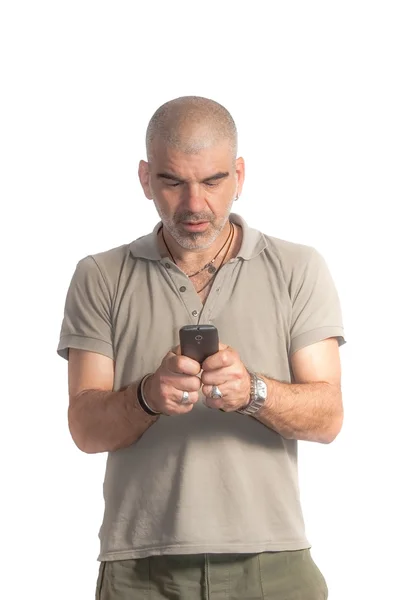 stock image Man looking his mobile phone