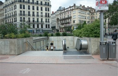 Exit from the subway station Bellecour, Lyon, France clipart