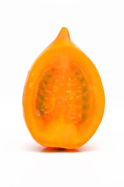 Plátek čerstvé oranžové rajče — Stock fotografie